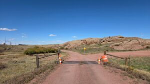 (4) gate entrance towards property