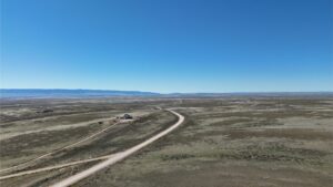 24) E Ormsby Rd heading W toward I-25 (property on right)