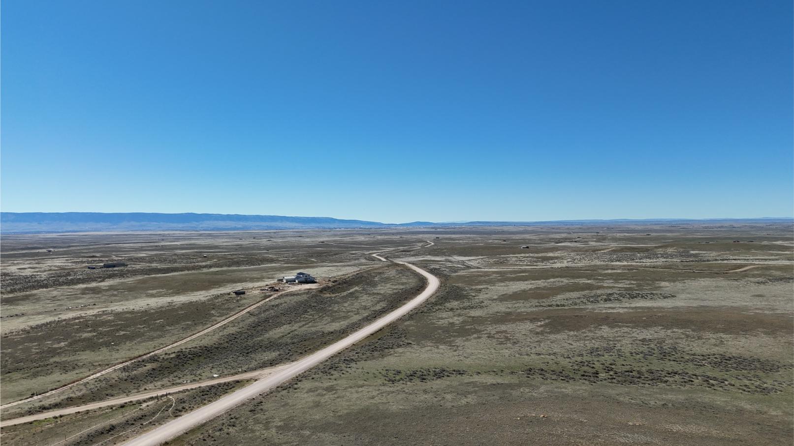 24) E Ormsby Rd heading W toward I-25 (property on right)