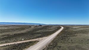 9) E Ormsby Rd heading W toward I-25 (property on right)