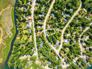 Top-down aerial of the 0.26-acre Angel Island parcel boundaries beside a curving road near Bull Lake